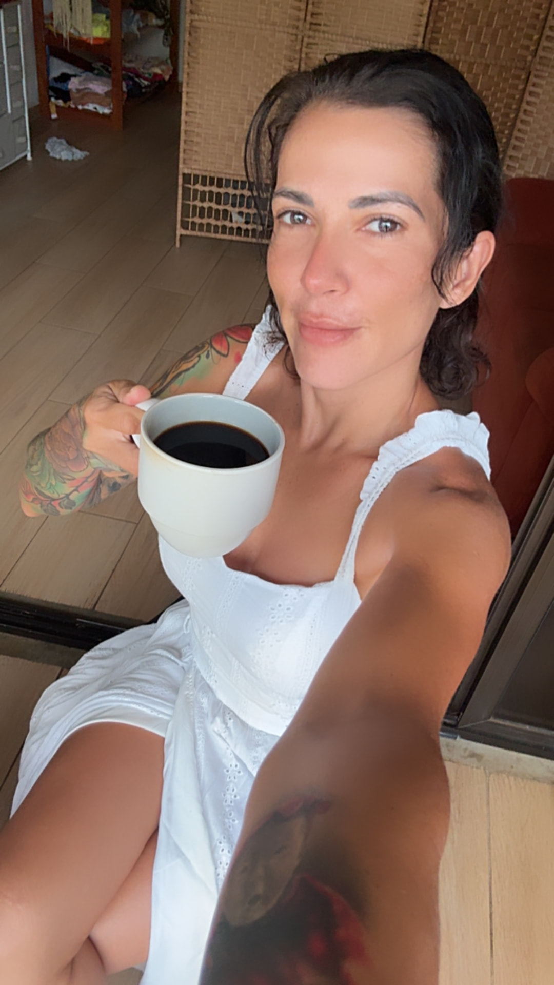 Melissa enjoying a quiet moment with coffee